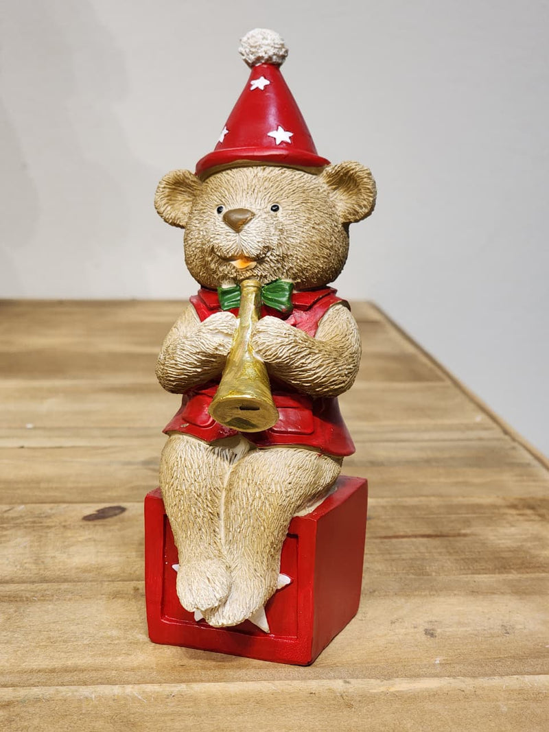 URSO EM RESINA MUSICO COM CORNETA 20CM